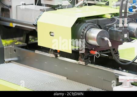 Industrial plastic injecting machine. Stock Photo
