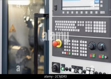Automated CNC toolroom lathe with control console. Stock Photo