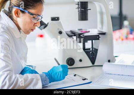 Researcher in laboratory. Stock Photo