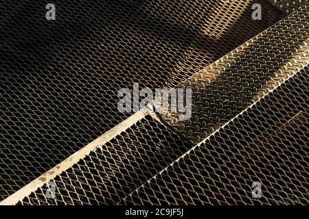 black dark steel metal texture net floor grunge architecture background Stock Photo