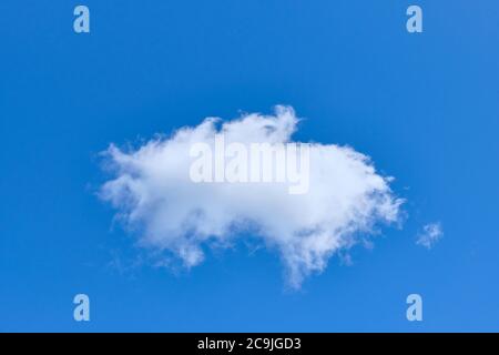 White solitary cloud in blue cloud close up Stock Photo