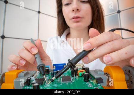 Engineer working on circuit board. Stock Photo