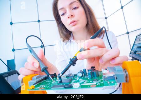 Engineer working on circuit board. Stock Photo