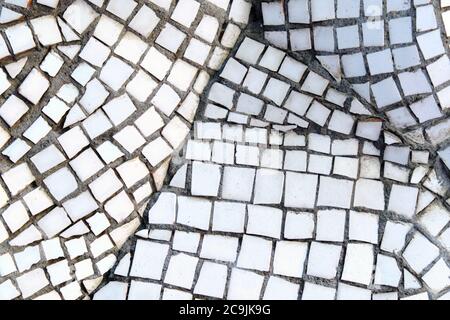 Texture from a mosaic of white pieces. Stock Photo