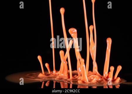 Splashing paint. Stock Photo