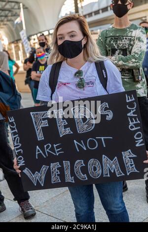 Detroit, Michigan, USA. 31st July, 2020. A rally at the Federal Building opposes President Trump's plan to send federal police to Detroit. Protesters said federal money should instead be used for health and income support during the coronavirus pandemic. Credit: Jim West/Alamy Live News Stock Photo