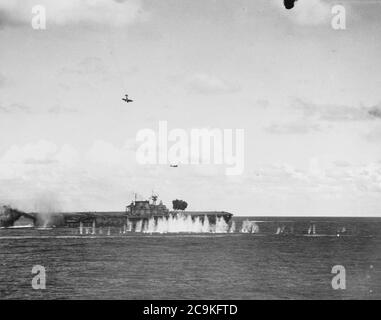 Japanese aircraft attack USS Hornet (CV-8) during the Battle of the Santa Cruz Islands on 26 October 1942 Stock Photo