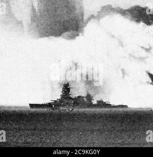 Japanese battleship Nagato at Baker shot of Operation Crossroads Bikini Atoll July 25 1946 just after detonation- Crossroads Baker Base Surge (cropped). Stock Photo