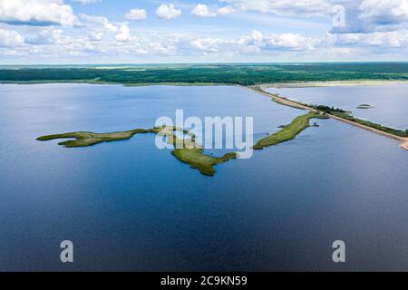 panoramic view of blue lake with islands and green forest. lake landscape in Belarus