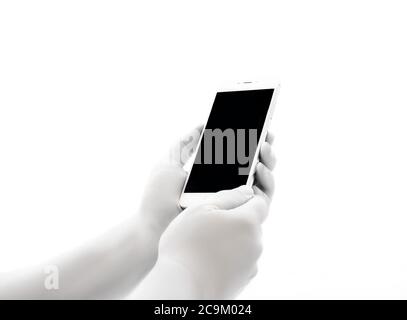Human bionic hands holding electronic device on white background.  Artificial intelligence futuristic concept Stock Photo