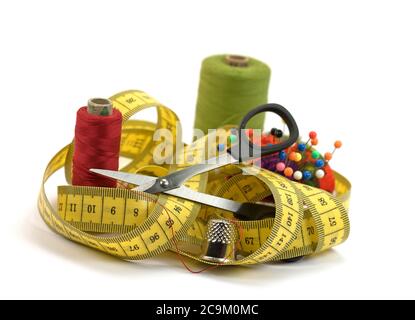 Sewing utensils against white background Stock Photo