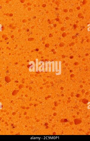 Surface of an orange sponge Stock Photo