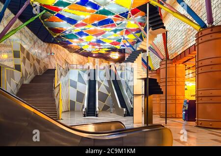 LISBON, PORTUGAL - FEBRUARY 2, 2019: Famous, beautiful and colorful main hall and escalator of the Olaias metro subway station in Lisbon, Portugal, on Stock Photo