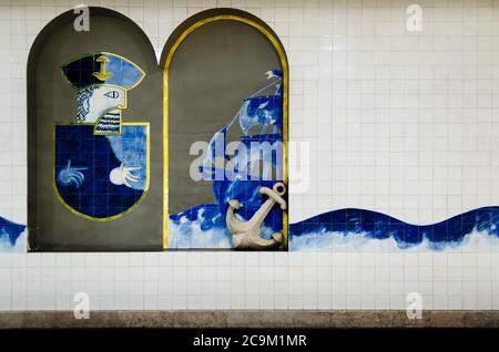 LISBON, PORTUGAL, FEBRUARY 2, 2019: Typical portuguese azulejos art, with painted white and blue tiles representing Vasco da Gama in a subway metro st