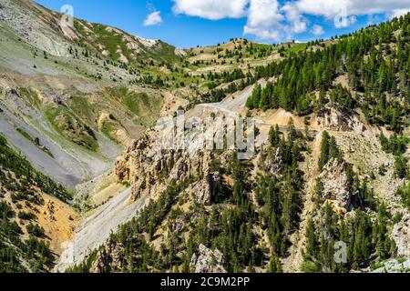 The scenic landscape of the Casse Deserte en route to the Col d'Izoard, one of the most iconic mountain pass of the Tour de France Stock Photo