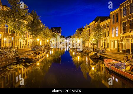 Leiden, Netherlands - July 22, 2020: Cityscape Leiden view Old Rhine with canal, houses and bridge during the summer. Stock Photo