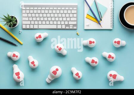 Business teamwork concepts with person sign on group of lightbulb on worktable.inspiration and motivation.brainstorming and sharing ideas.performance Stock Photo