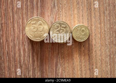 Kopeks the Ukrainian currency, coins on a wooden table. Stock Photo