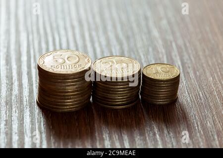 Kopeks the Ukrainian currency, coins on a wooden table. Stock Photo