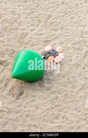 A buoy washed up on the beach at Brighton Stock Photo - Alamy