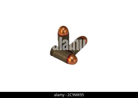 Three 9mm caliber combat pistol cartridges for Makarov pistol on white isolated background side view, weapons and weapons concept Stock Photo