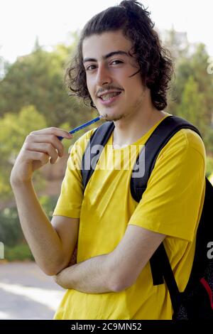 portrait of a handsome young man back to school Stock Photo