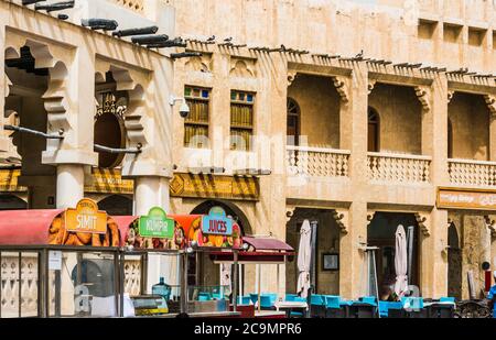 DOHA, QATAR - FEB 26, 2020: Traditional architecture of Souq Waqif, popular touristic destination in Doha, Qatar Stock Photo