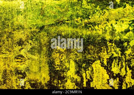 Yellow colored abstract wall background with textures of different shades of lemon yellow Stock Photo