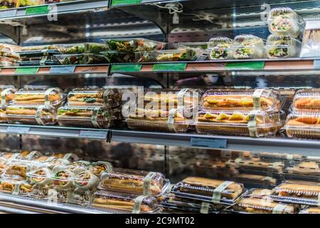 Pre-packaged foods displayed in a commercial refrigerator Stock Photo ...