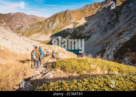 Octomber 07, 2019. Arkhyz, Russia. Group of hiker tourists in the mountains. Stock Photo