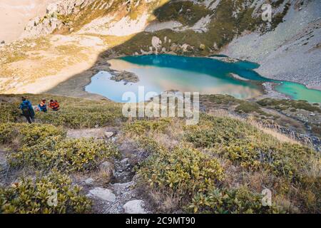 Octomber 07, 2019. Arkhyz, Russia. Group of hiker tourists in the mountains. Stock Photo