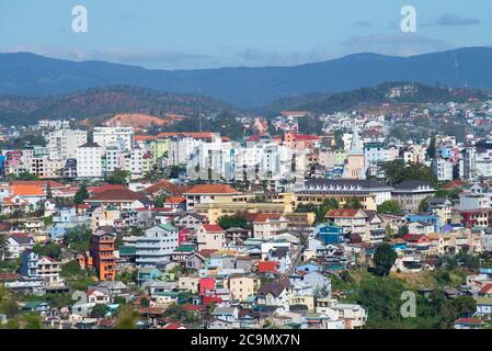 DA LAT, VIETNAM - DECEMBER 28, 2015: Landscape of the city of Da Lat in the sunny day. Top view Stock Photo