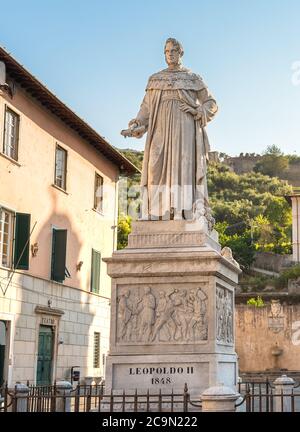 Marble statue on a pedestal to Leopoldo II in main square of Pietrasanta, Tuscany, Italy Stock Photo