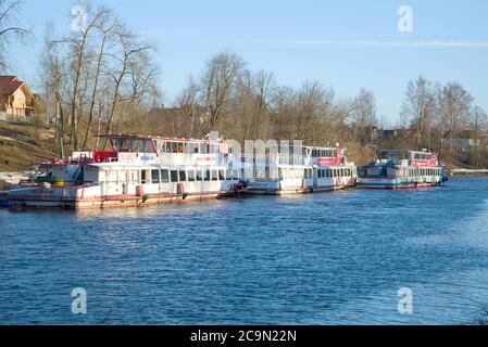 ST PETERSBURG, RUSSIA - APRIL, 2018: Parking of tourist motor ships 'Moscow' on the river Izhora before the summer navigation. Ust-Izhora Stock Photo