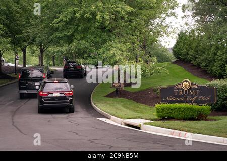 Sterling, United States. 01st Aug, 2020. Protesters hold signs outside