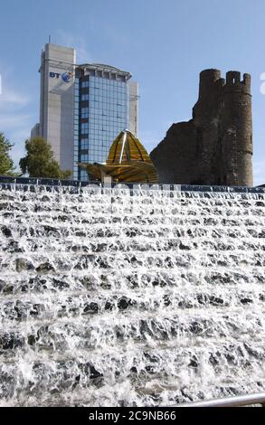 The City of Swansea, South Wales, UK. Castle Square waterfall and the old Castle in the City Centre. 10/5/04 Stock Photo