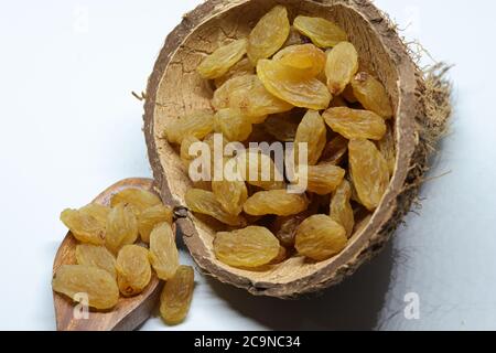 Yellow sultanas raisins isolated on white background cutout Stock Photo