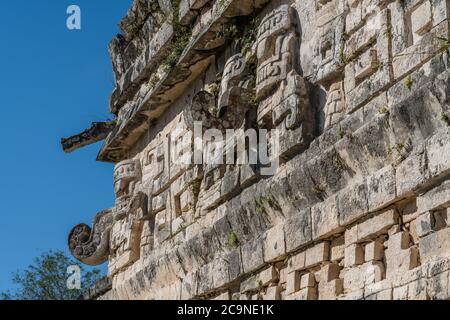 Chaac masks on the facade of the Iglesia or Church in the Nunnery Complex in the ruins of the great  Mayan city of Chichen Itza, Yucatan, Mexico. Stock Photo