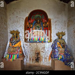 Green Tara-female bodhisattva or Buddha with attendants Marici-Ekajata-Thirtythree Heaven Grottoes-MatiSi-Gansu-China-0987 Stock Photo