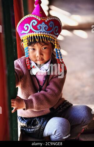 Little girl of the Yugur ethnic group. Horse Hoof Temple-Zhangye-Gansu-China-0998 Stock Photo