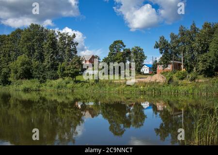 Borisoglebsky, Yaroslavl region, Russia, - 26 July 2020, Residential house near pondin summer time. Stock Photo