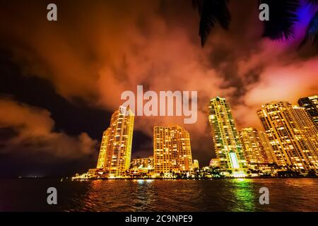 Skyscrapers seen from Miami riverwalk at night. Florida, USA Stock Photo