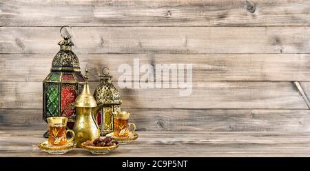Holidays banner. Oriental lantern decoration on wooden background Stock Photo