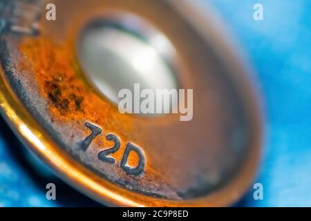 Extreme close up of a pair of jeans' metal button Stock Photo