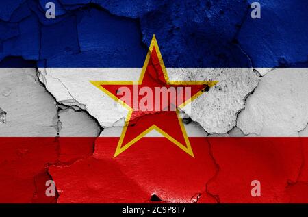 flag of Yugoslavia painted on cracked wall Stock Photo