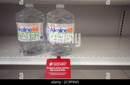 Cocoa Beach, United States. 01st Aug, 2020. August 1, 2020 - Cocoa Beach, Florida, United States -Two bottles of water remain on a shelf at a Winn-Dixie supermarket as shoppers stock up on water in preparation for the arrival of Hurricane Isaias on August 1, 2020 in Cocoa Beach, Florida. The storm is forecast to approach the coast of Florida tonight as a Category 1 storm and then parallel the Atlantic coast as it moves north. Credit: Paul Hennessy/Alamy Live News