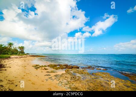 Clouds over Autre Bord beach in Le Moule, Guadeloupe. Guadeloupe is a archipelago of French West Indies in Lesser Antilles, Caribbean sea Stock Photo