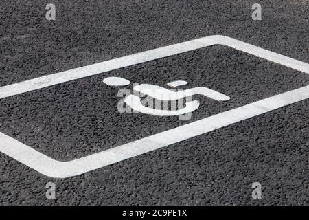 parking spot for disabled drivers, road marking on asphalt road Stock Photo