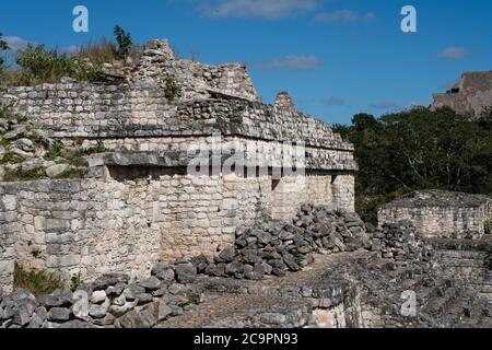 One of the partially restored ruins of the twin temples on top of Structure 17 in the ruins of the pre-Hispanic Mayan city of Ek Balam in Yucatan, Mex Stock Photo