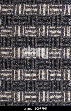 The texture of a knitted wool brown. Background. High resolution photo. Full depth of field. Stock Photo